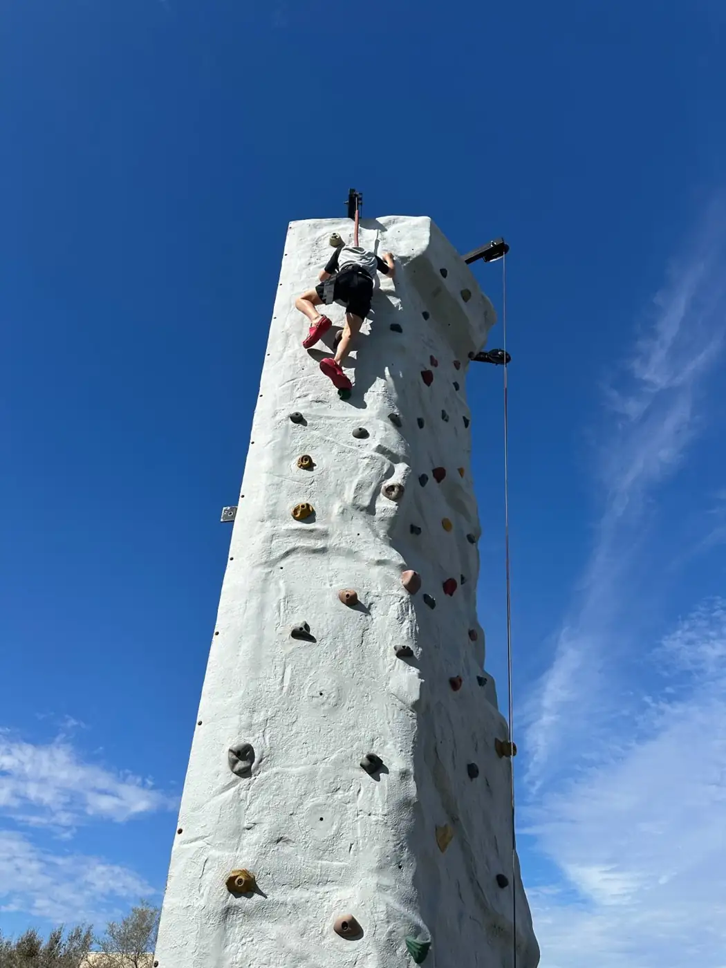 MJT mobile rock-climbing wall set up outdoors