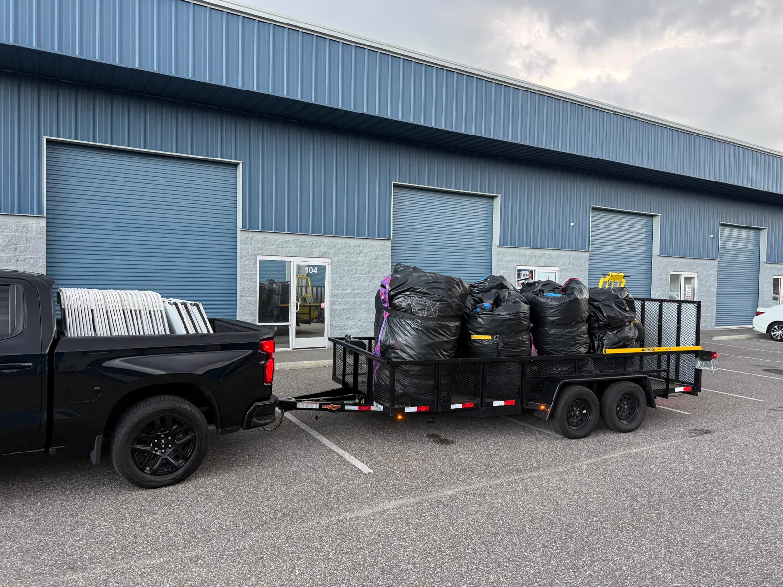 Cleaned and rolled inflatables loaded on our trailer, ready for delivery