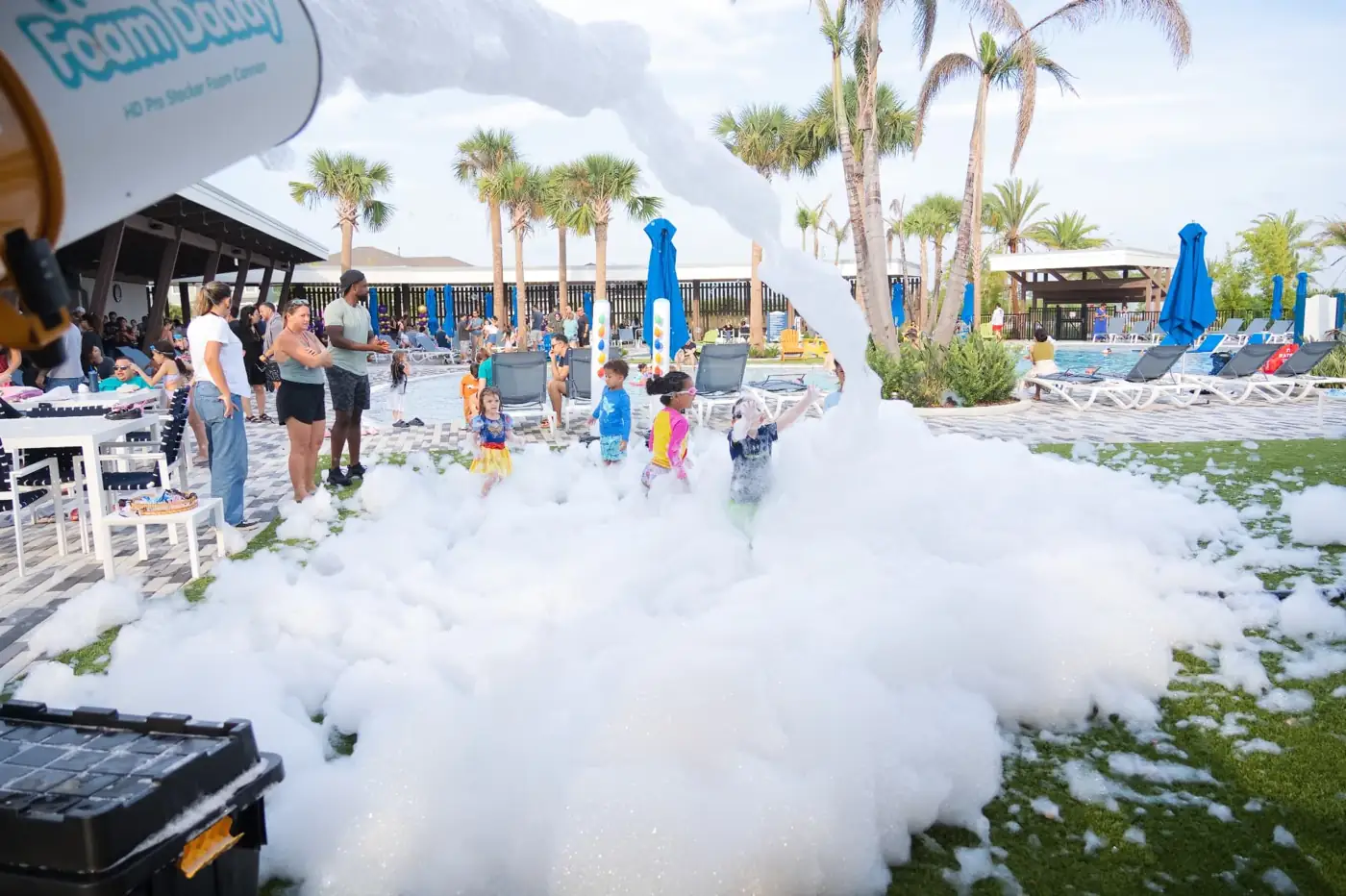 MJT foam party with guests at an outdoor venue